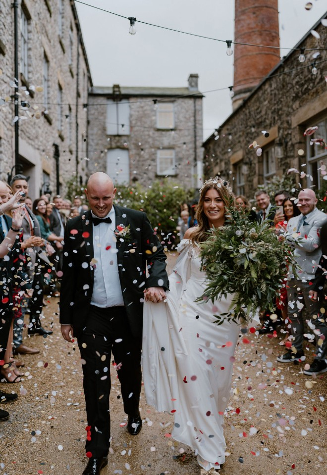 Bride and groom confetti shot