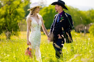 Bride and groom holding hands