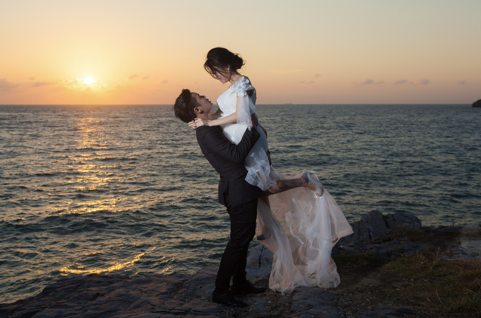 A married couple on the beach