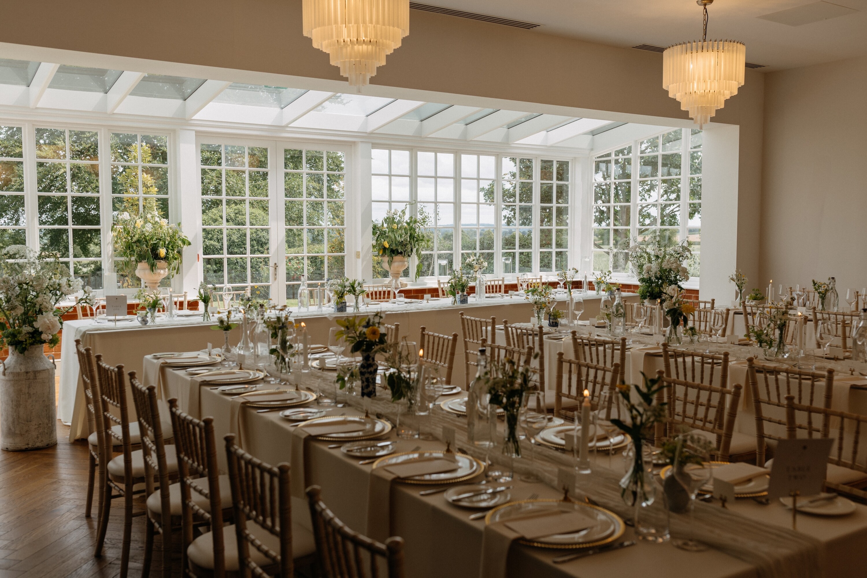 Wedding breakfast set up with family style tables