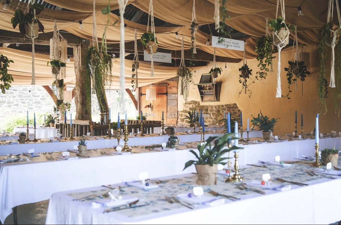 Interior of Hayne Devon Barn set for wedding breakfast