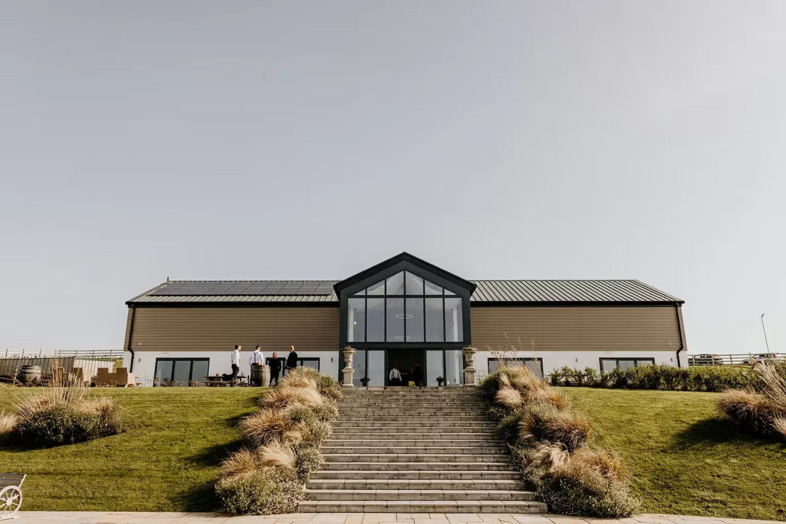 Exterior of the modern barn at Cornwall wedding venue, The Barn at Pengelly