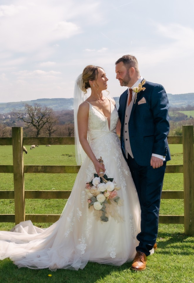 bride and groom posed wedding photographs