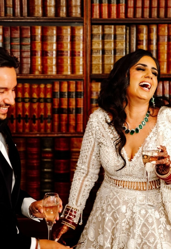 Couple smiling and enjoying wine together