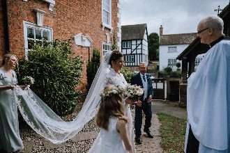 Lucy and her bridal party outside the church