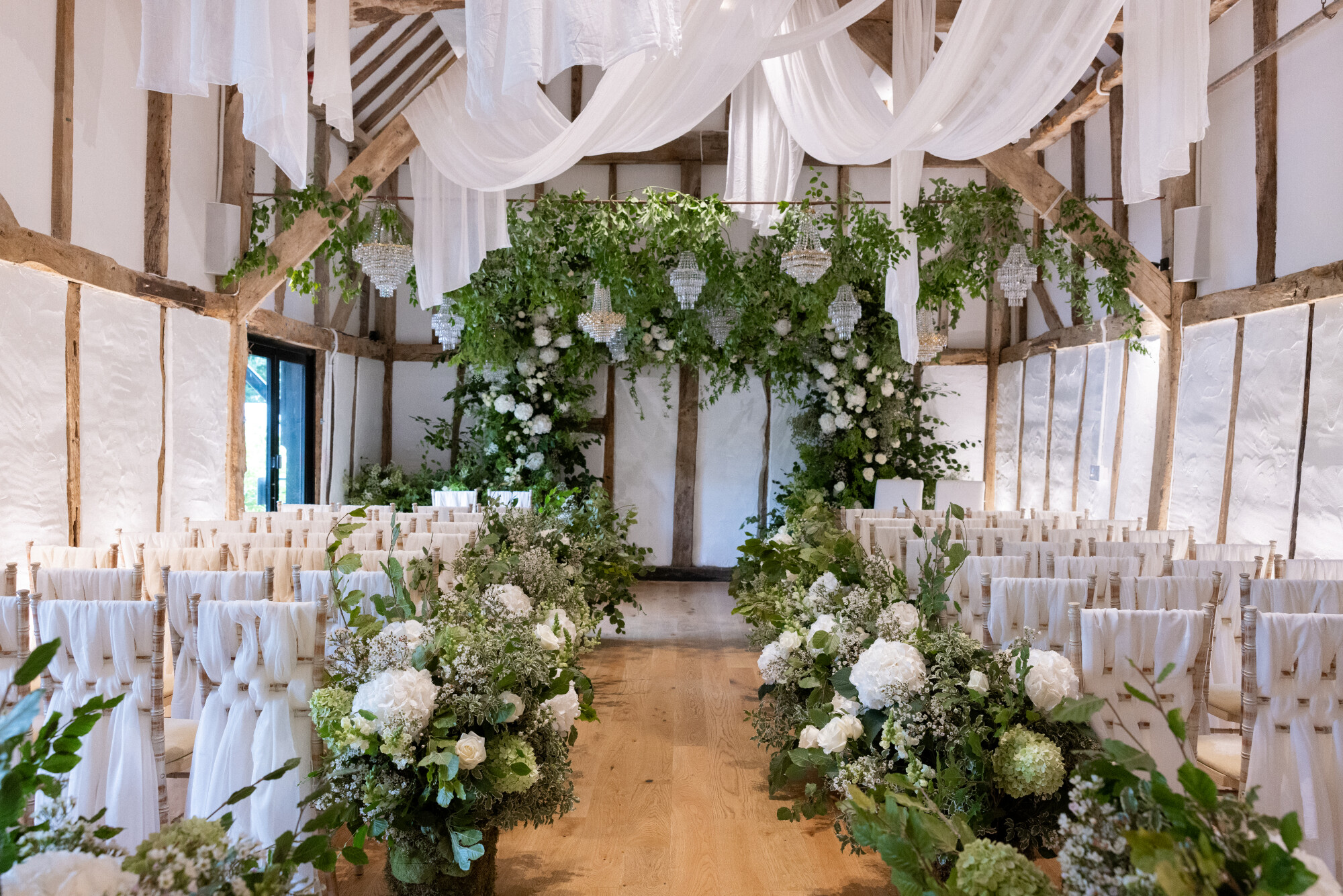 Interior of a ceremony set-up at Alfriston Gardens - an exclusive use wedding venue in East Sussex