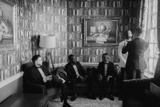 Groom getting ready before wedding at Hedsor House