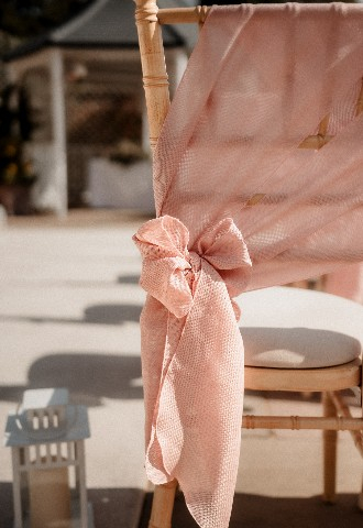 Light pink chair bow detail at Southdowns Manor West Sussex