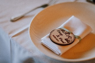 Lucy and Pauls table decor with wedding date