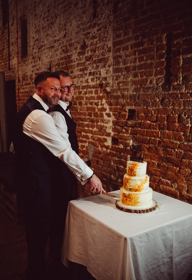 Wedding couple cutting the cake at Copdock Hall Suffolk