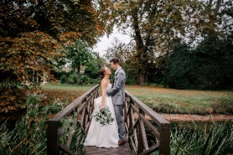 Bride and groom on bridge at Ardington House Wedding