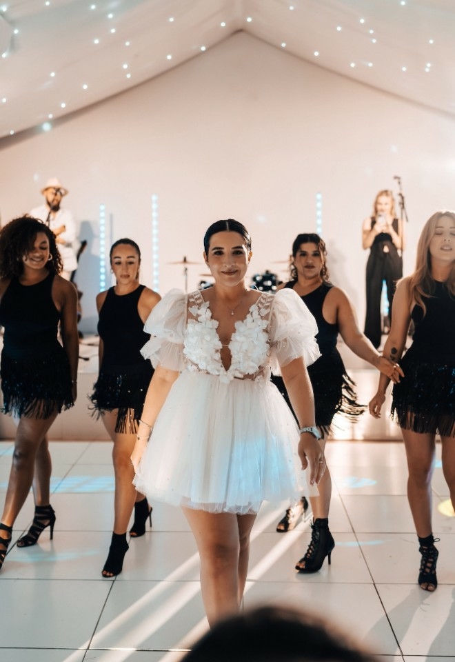 Sophie dancing with her bridesmaids