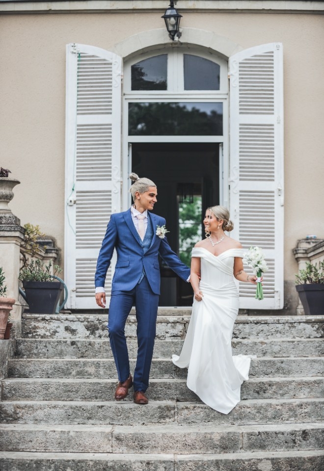Bride and groom outside of Chateau Vary