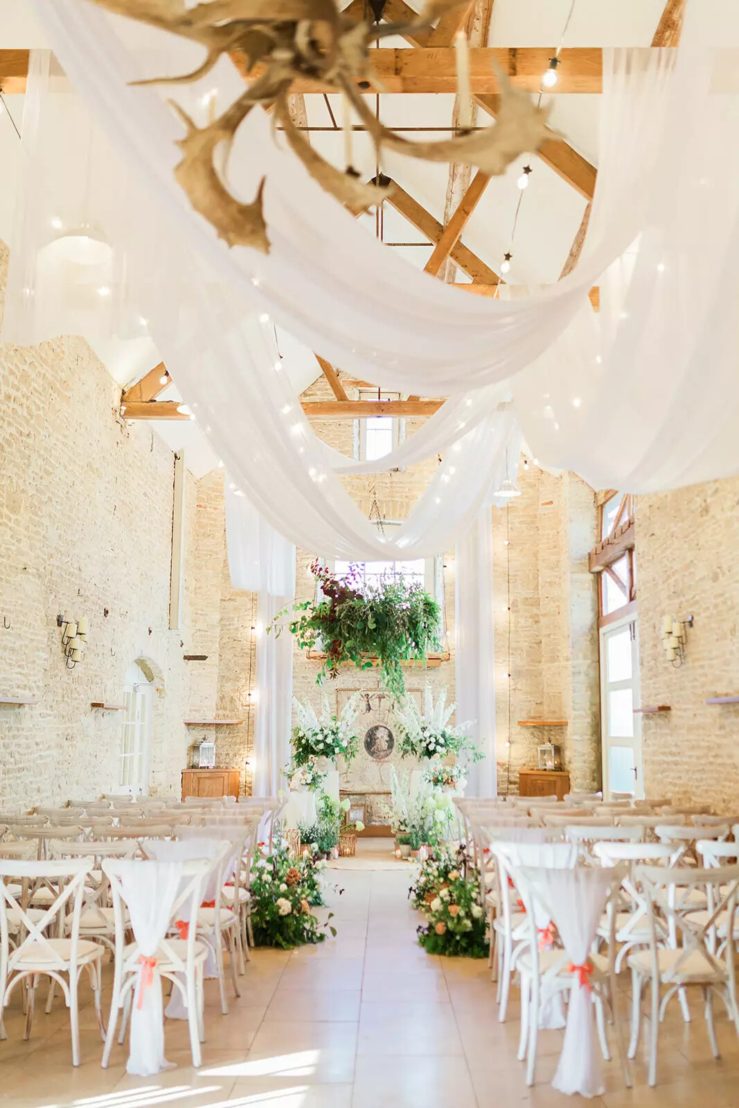 Elegant draping decorating a wedding ceremony space