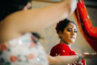 Bride looking at her dress