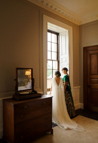 Bridal Portraits - Ana and Satveer looking out of the window