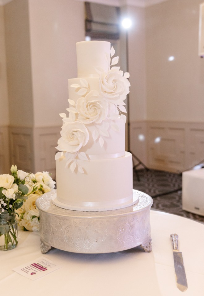 white 4 tier wedding cake