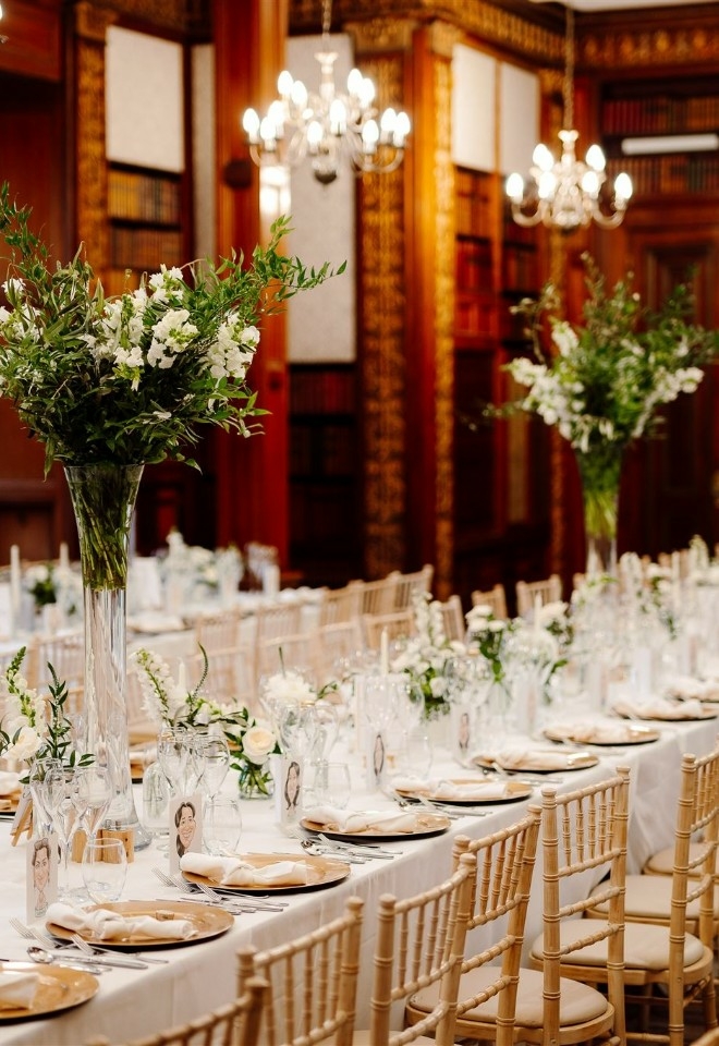 Dining set up with beautiful floral gardens in the middle
