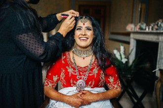Bride having make up done