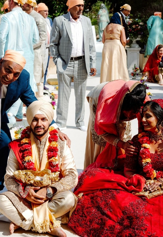 Couple posing with their loved ones