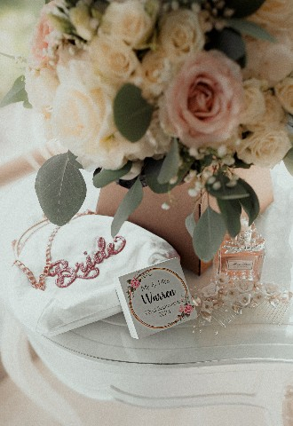 Details from wedding day at Southdowns Manor including jewellery, perfume and flowers