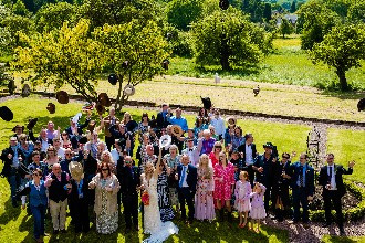Couple and wedding guests
