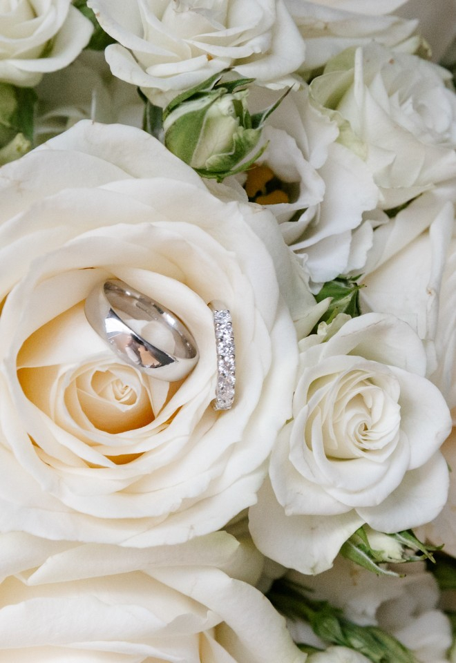 Wedding bands inside bridal bouquet flower