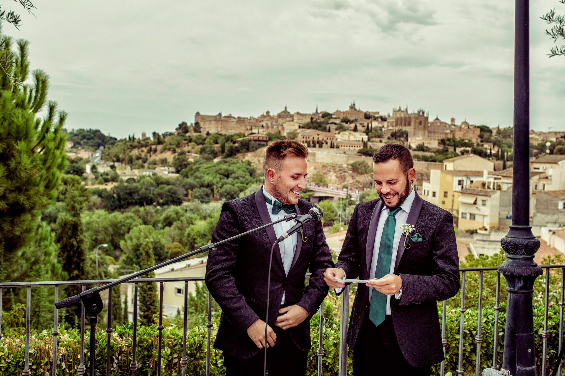 Groom and groom couple sharing a personal speech during their wedding celebration