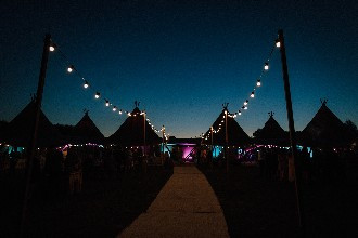 Alcott weddings tipi at night