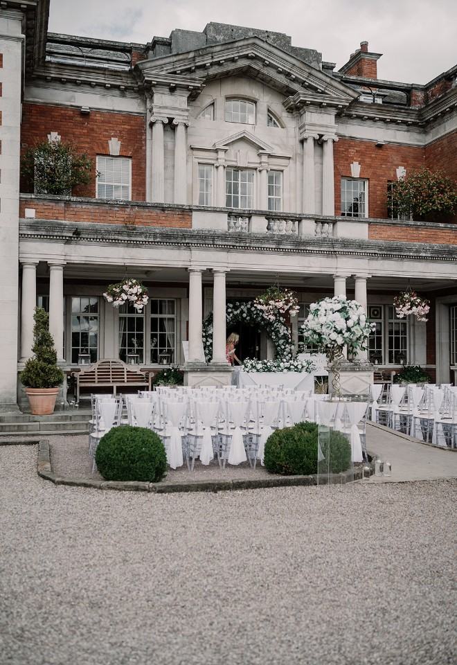 Outdoor wedding ceremony at Eaves Hall