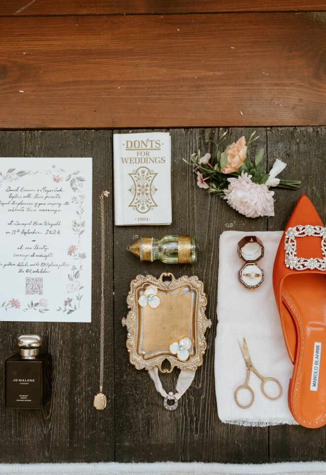A flat lay image of wedding details