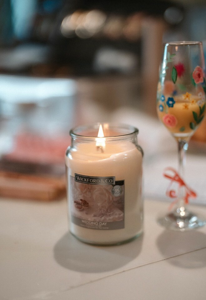 Candle named "Wedding Day" burning