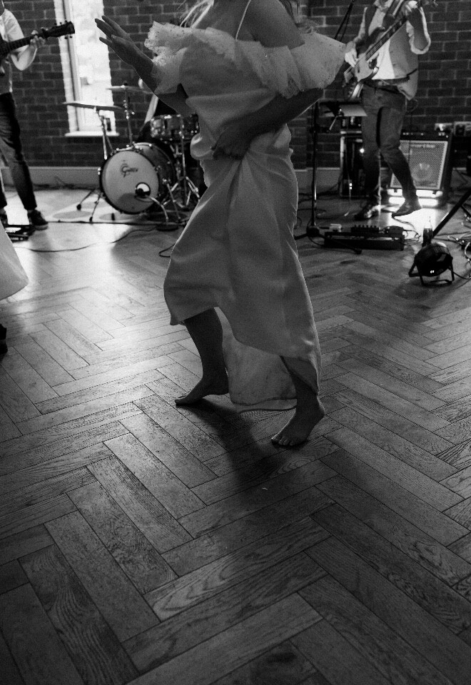 Bride having fun on the dance floor 