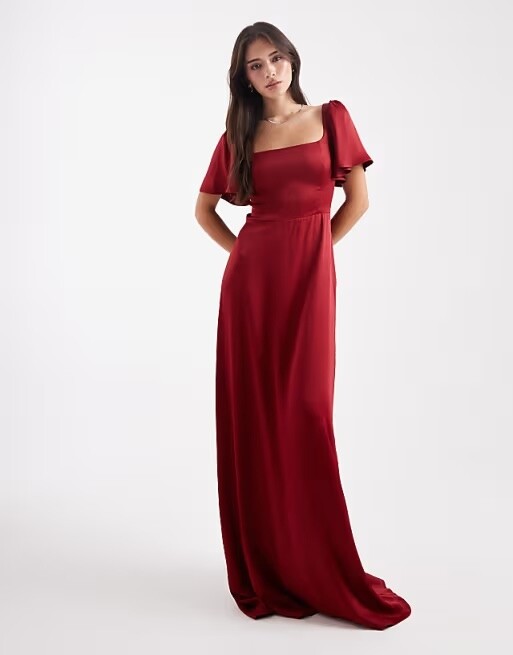 Burgundy square neck bridesmaid maxi dress with flutter sleeves for a spring wedding