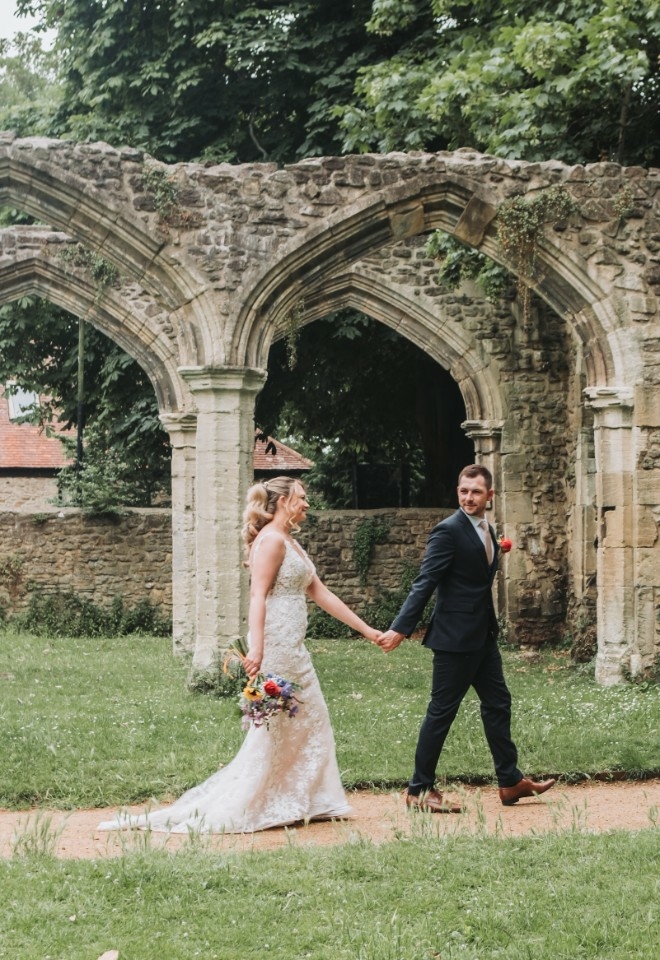 Kyle and Rosie walking in the garden