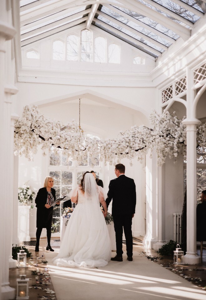 wedding couple at end of aisle