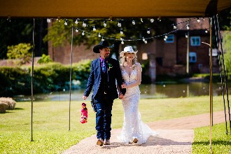 Bride and Groom arriving for wedding reception