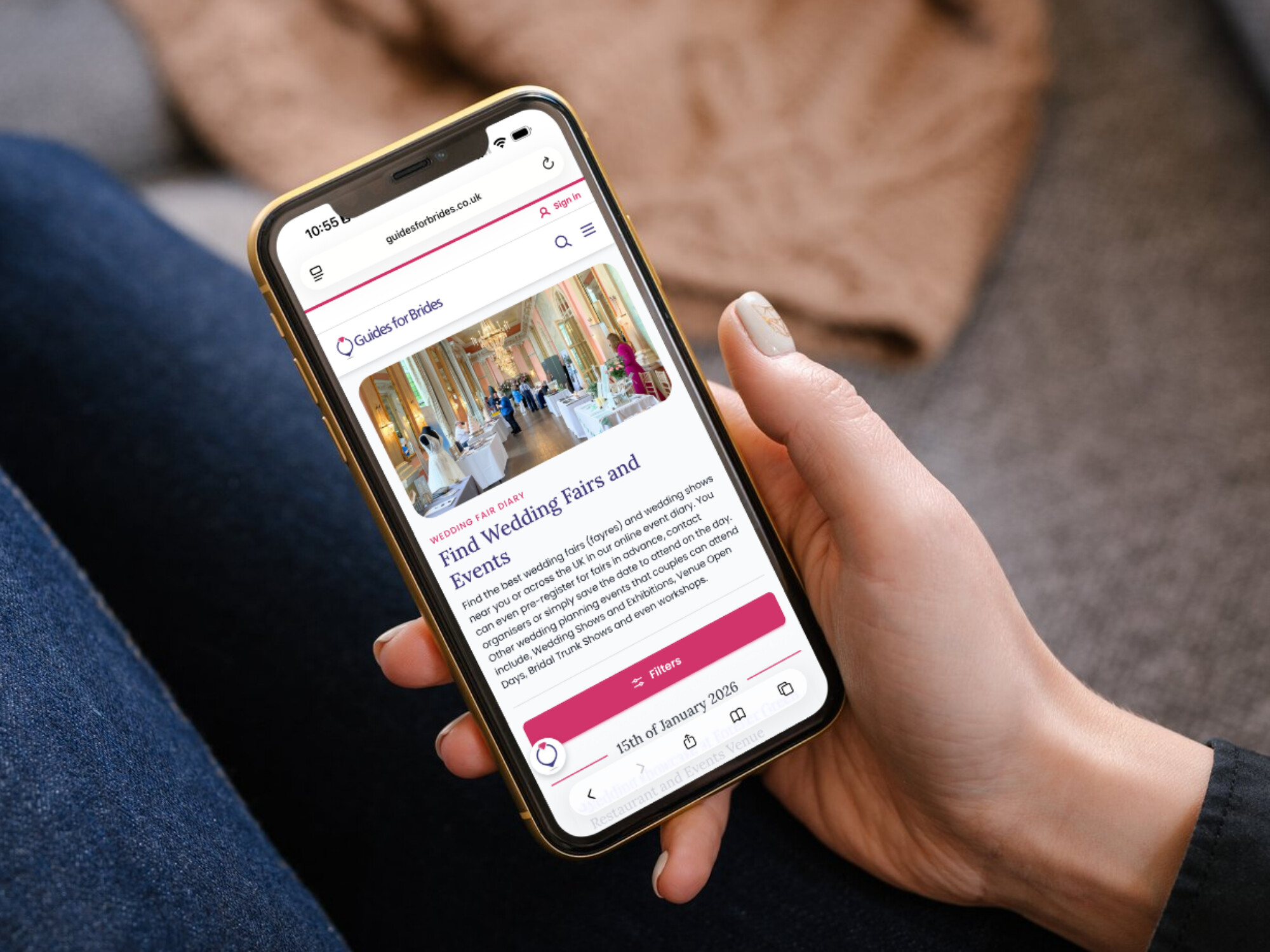 Close up of users hands with a mobile phone, they are looking at the Guides for Brides wedding fair diary