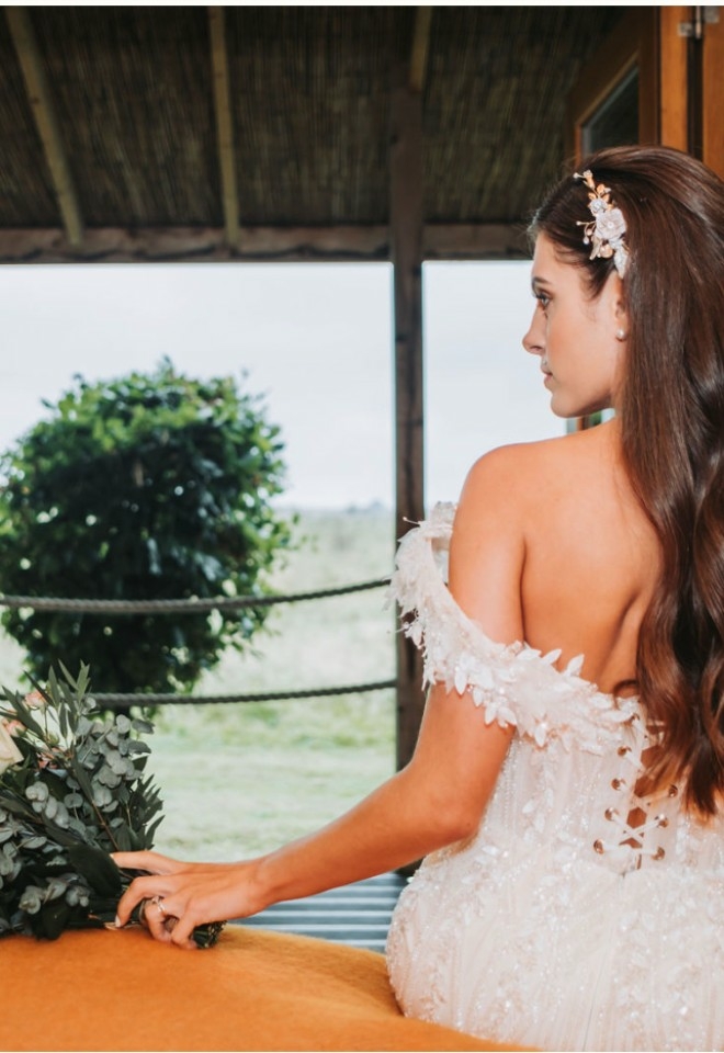 Bride sitting on the bed