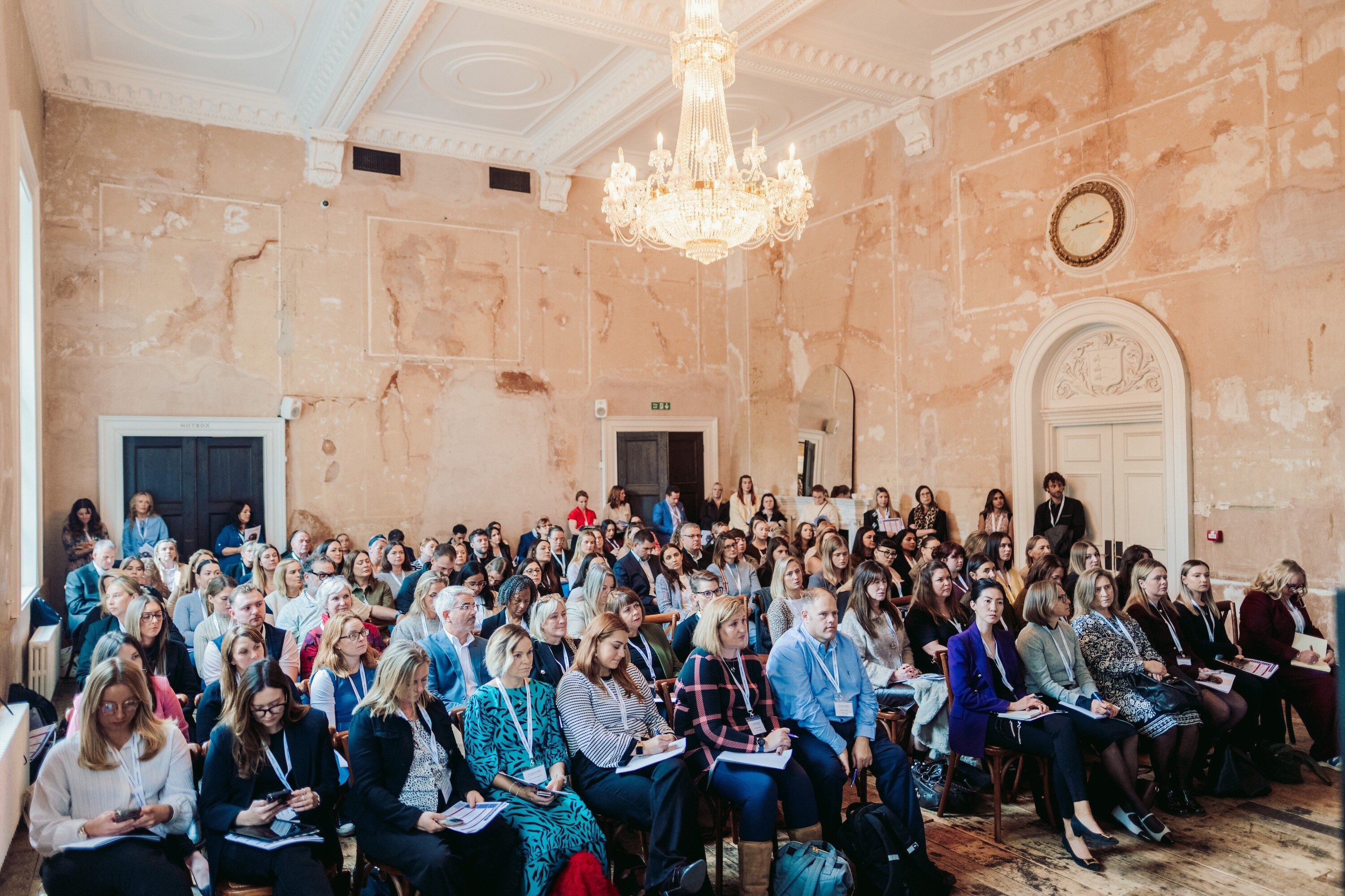 attendees sat in the main room at Old Sessions House London for the Guides for Brides UK Wedding Conference
