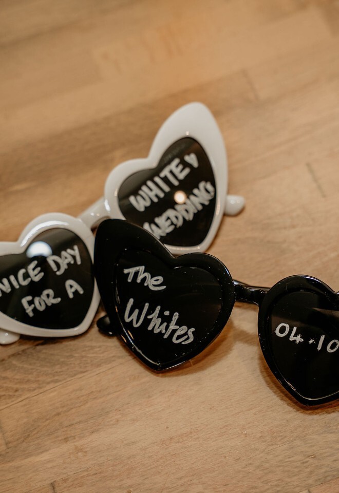 wedding personalised heart shaped sunglasses with the couples name and wedding date