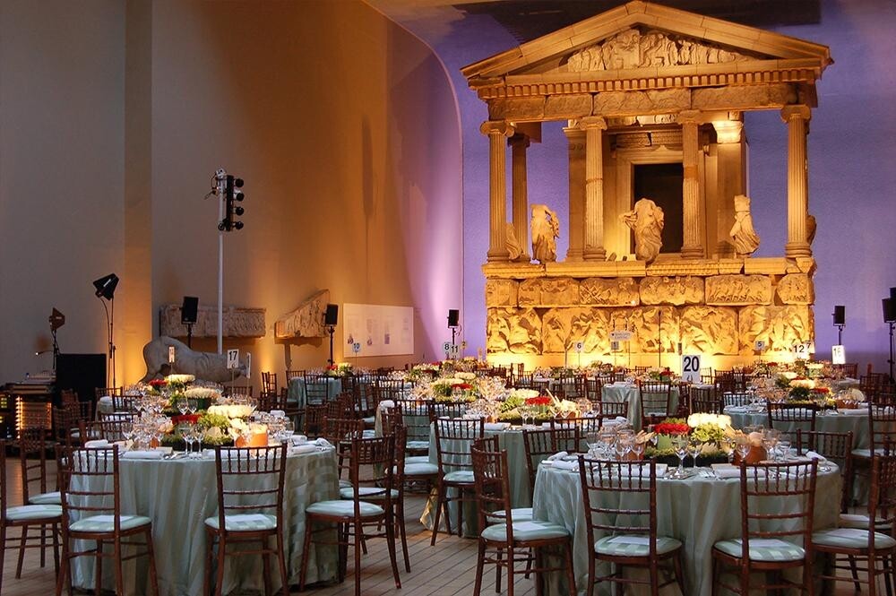 the british museum with wedding breakfast set up with historic artefacts