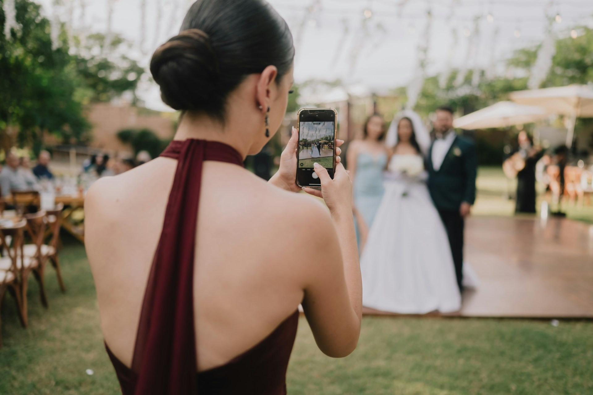 wedding content creator taking content of wedding couple