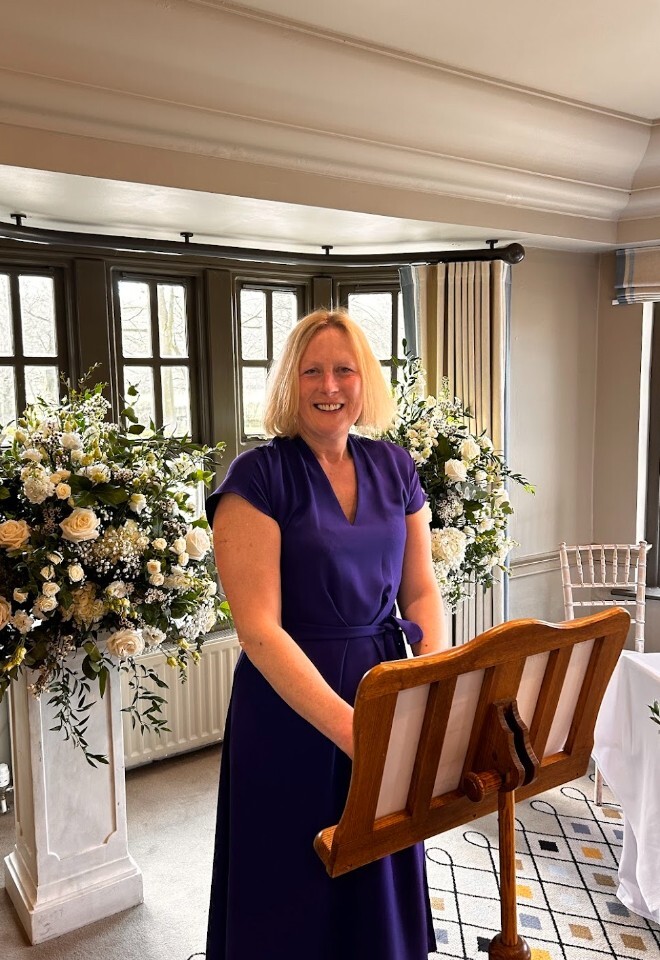 image of Helen Fenton,Celebrant standing at a lecturn