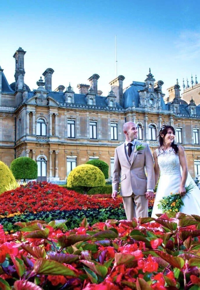 Bride and groom in the gardens at Waddesdon Manor