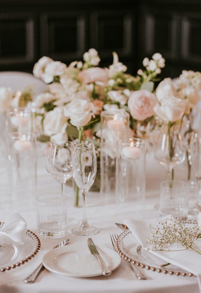 Elegant wedding table styling with candles and floral centrepiece at The Collector’s Hall in Glasgow