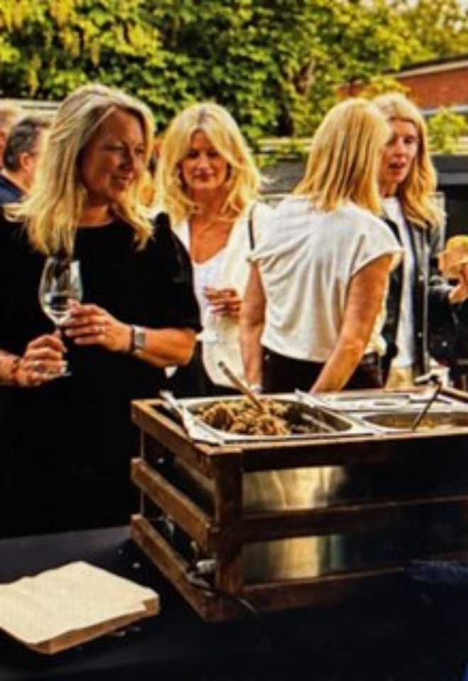Guests enjoying freshly cooked hog roast catering at a Lancashire wedding