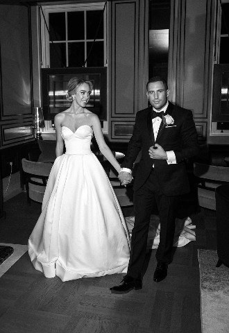 Bride and Groom walking through The Biltmore