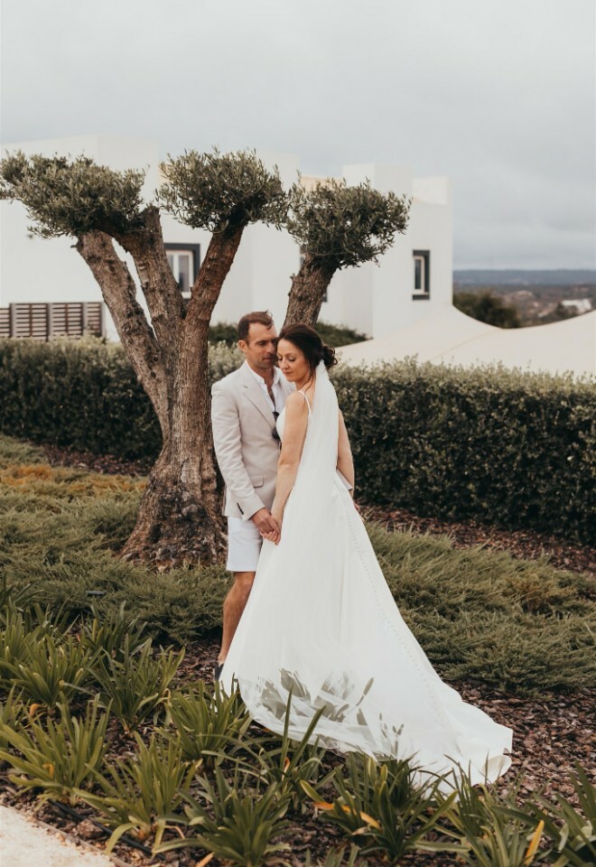 Relaxed Couple in the Garden of Casa Monte Cristo by the Olive Trees