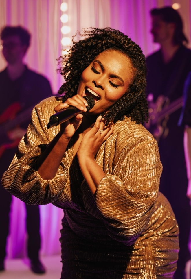 Singer performs on stage